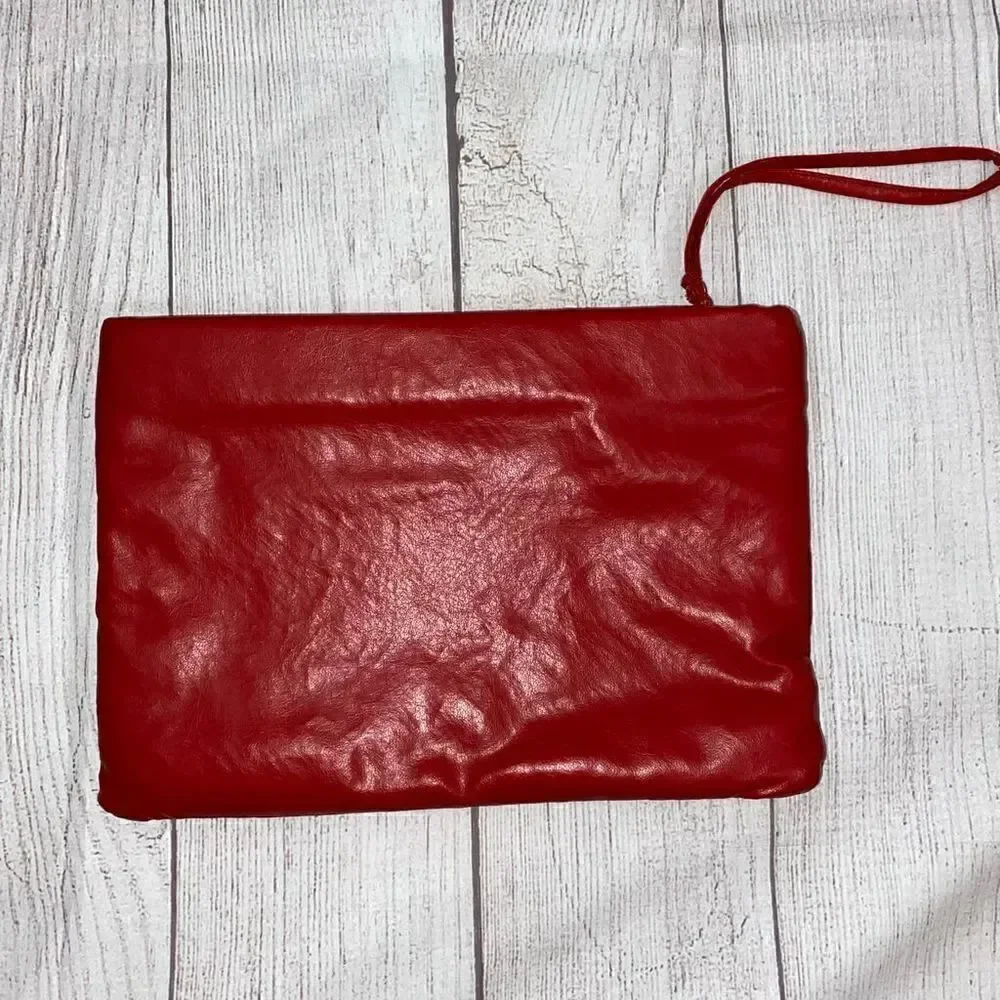Clutch purse with wrist strap, zipper closure red